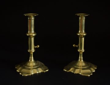 Pair of early 18th century slide ejector candlesticks Pair of early 18th century slide ejector candlesticks